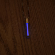 Load image into Gallery viewer, Tritium glow in the dark bright blue necklace with a silver coloured cap and stainless steel ball chain.