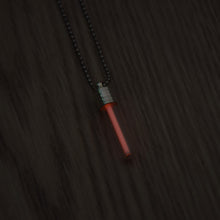 Load image into Gallery viewer, Tritium glow in the dark bright red necklace with a silver coloured cap and stainless steel ball chain.