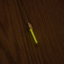 Load image into Gallery viewer, Tritium glow in the dark bright yellow necklace with a silver coloured cap and stainless steel ball chain.
